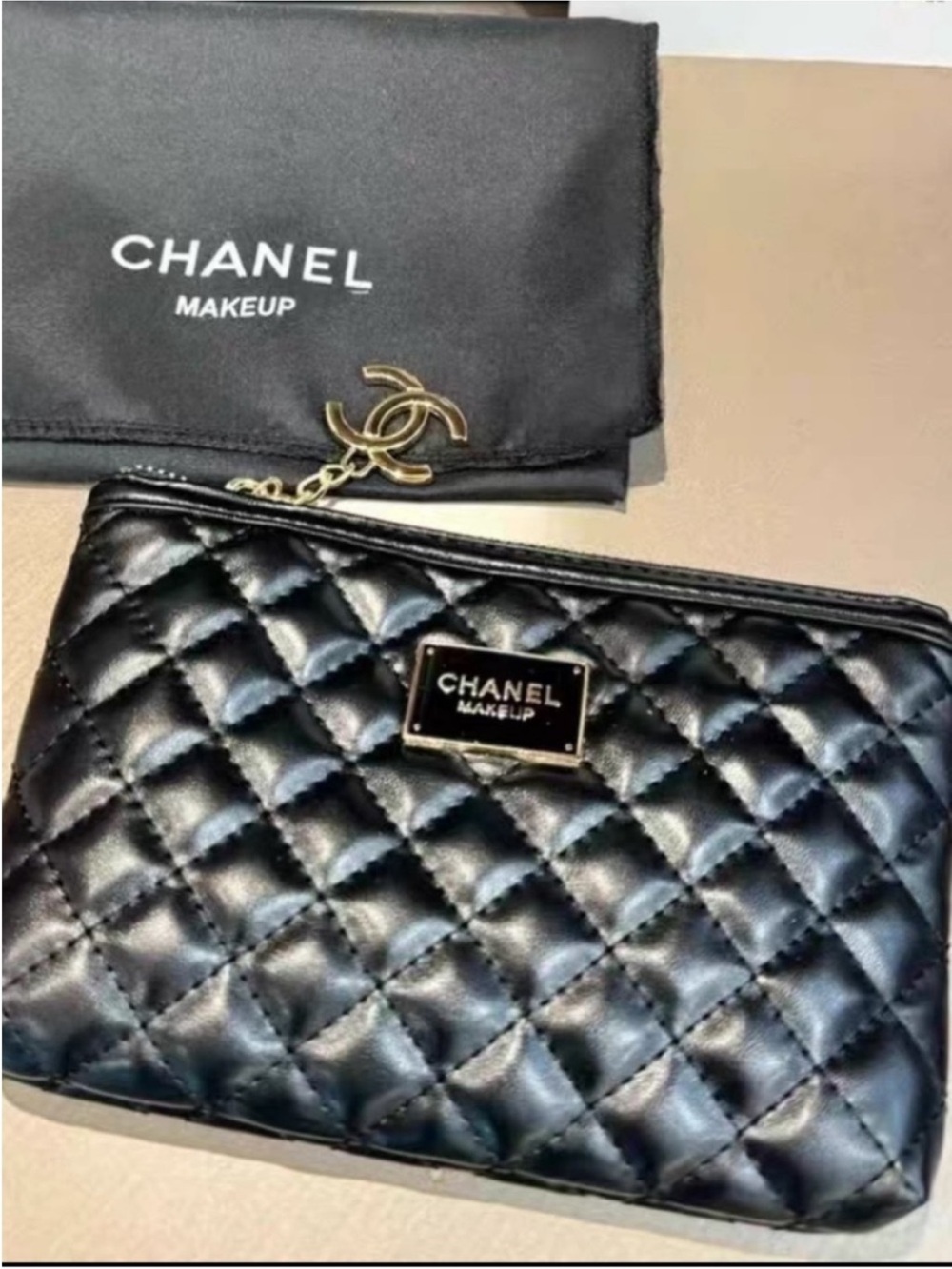 CHANEL Black Quilted Makeup Pouch with Gold-Tone Logo Charm
